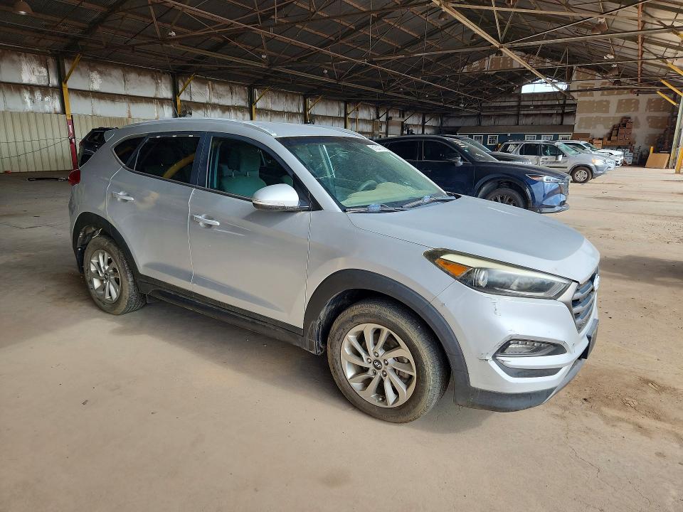 2016 Hyundai Tucson VIN KM8J33A20GU212733 COPART salvage auction — MINOR DENT/SCRATCHES, Az - Certificate Of Title, sold $1,250 on 2026-07-27 (photo 4)