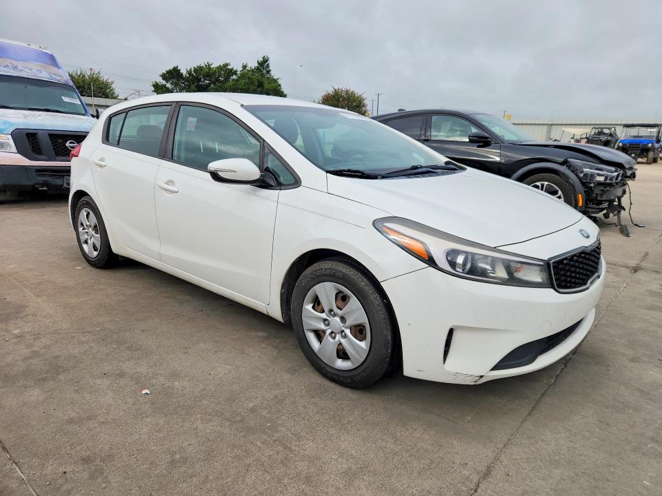2017 Kia Forte VIN KNAFK5A87H5718209 COPART salvage auction — REAR END, TX - CERT OF TITLE-REBUILT SALVAGE (P), sold $950 on 2026-07-30 (photo 4)