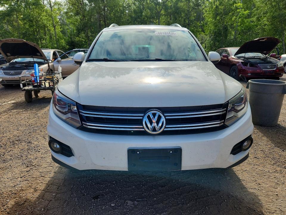 2012 Volkswagen Tiguan VIN WVGBV7AX4CW604498 COPART salvage auction — MINOR DENT/SCRATCHES, On - Permit No Brand - Unfit, sold $425 on 2026-07-29 (photo 5)