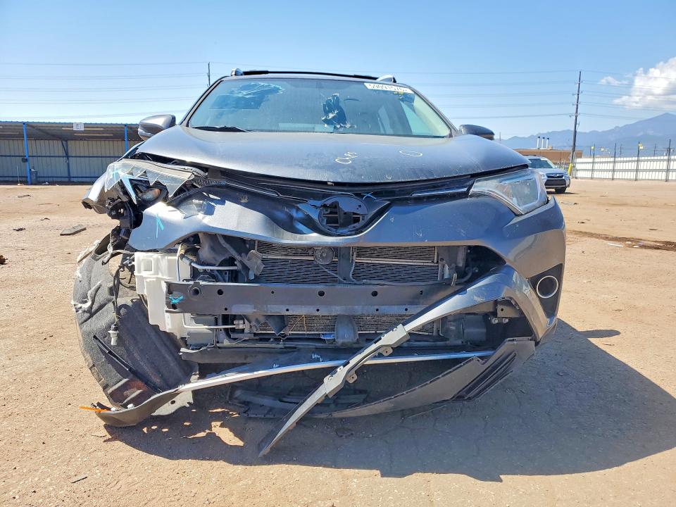 2016 Toyota Rav 4 VIN JTMRJREV1GD030544 COPART salvage auction — FRONT END, CO - CERT OF TITLE W/LEMON LAW HIST, sold $5,700 on 2026-08-03 (photo 5)