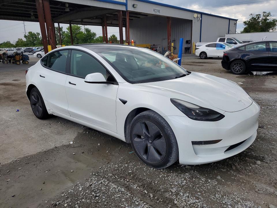 2023 Tesla VIN 5YJ3E1EAXPF385844 COPART salvage auction — REAR END, Fl - Cert Of Title Slvg Rebuildable, sold $10,500 on 2026-07-31 (photo 4)