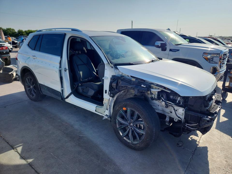2023 Volkswagen Tiguan VIN 3VVNB7AX7PM101937 COPART salvage auction — SIDE, TX - SALVAGE VEHICLE TITLE (P), sold $10,600 on 2026-08-20 (photo 4)