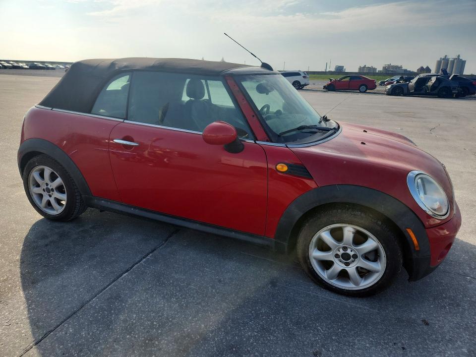 2010 Mini Cooper VIN WMWMR3C53ATZ19214 COPART salvage auction — NORMAL WEAR, LA - CERTIFICATE OF TITLE, sold $1,000 on 2026-08-12 (photo 4)
