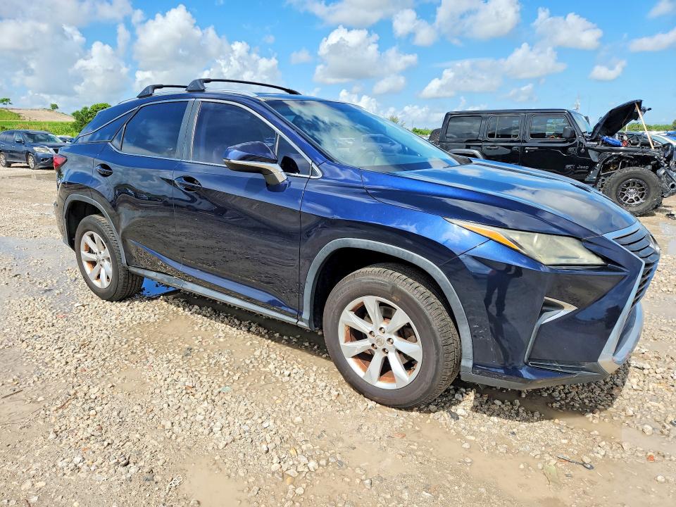 2016 Lexus Rx VIN 2T2ZZMCA1GC020651 COPART salvage auction — MINOR DENT/SCRATCHES, Fl - Certificate Of Title (P), sold $14,400 on 2026-07-28 (photo 4)