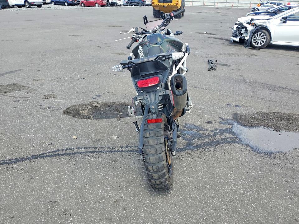 2022 Triumph motorcycle Tiger VIN SMTE67DF8NTAX0061 COPART salvage auction — ALL OVER, FL - CERT OF TITLE SLVG REBUILDABLE, sold $2,000 on 2026-07-30 (photo 4)
