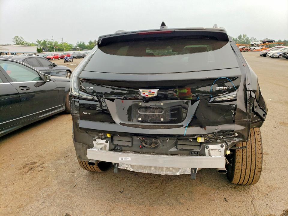 2024 Cadillac Xt4 VIN 1GYFZFR43RF127015 COPART salvage auction — REAR END, Ct - Cert Of Title-Salvage, sold $15,300 on 2026-08-14 (photo 6)