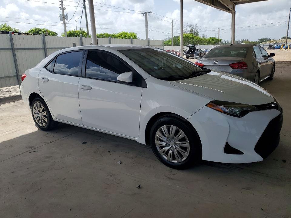 2017 Toyota Corolla VIN 5YFBURHE5HP593387 COPART salvage auction — MINOR DENT/SCRATCHES, Fl - Certificate Of Title, sold $3,900 on 2026-08-01 (photo 4)