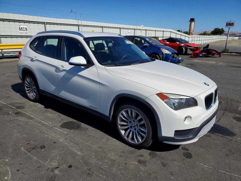 2015 BMW X1 VIN WBAVM1C58FV314463 COPART salvage auction — SIDE, CA - SALVAGE CERTIFICATE, sold $2,500 on 2026-08-03 (photo 4)