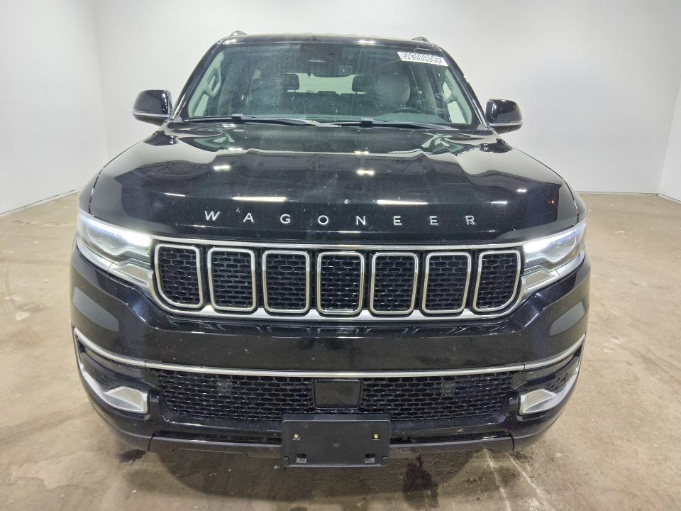 2022 Jeep Wagoneer VIN 1C4SJVATXNS184256 COPART salvage auction — MINOR DENT/SCRATCHES, Il - Certificate Of Title, sold $28,250 on 2026-08-27 (photo 5)