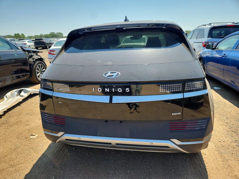 2023 Hyundai Ioniq 5 VIN KM8KNDAF9PU207859 COPART salvage auction — SIDE, Il - Salvage Certificate, sold $4,650 on 2026-07-30 (photo 6)