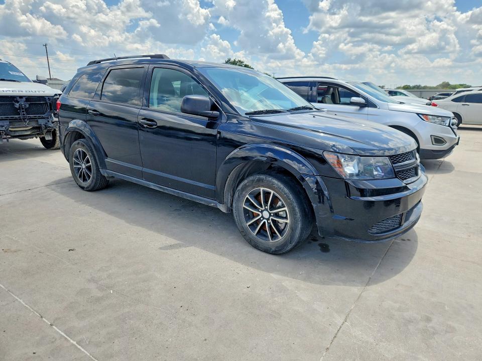2017 Dodge Journey VIN 3C4PDCABXHT706895 COPART salvage auction — MINOR DENT/SCRATCHES, TX - CERTIFICATE OF TITLE, sold $975 on 2026-08-02 (photo 4)