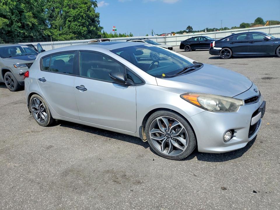 2015 Kia Forte VIN KNAFZ5A39F5298661 COPART salvage auction — SIDE, Nc - Dealer Only Clean Title, sold $3,000 on 2026-07-14 (photo 4)