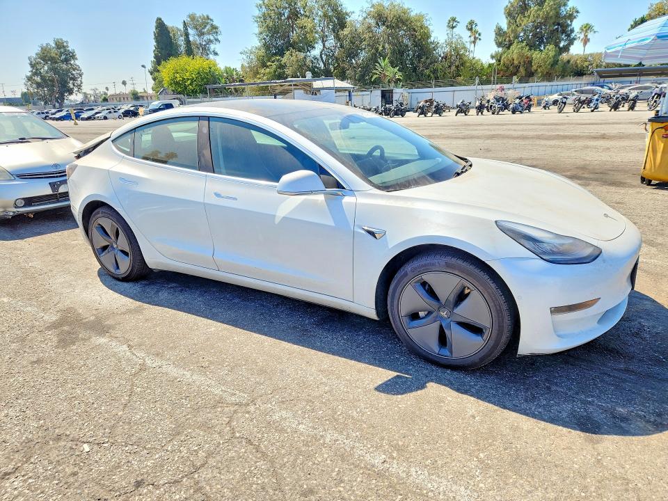 2019 Tesla Model 3 VIN 5YJ3E1EA4KF401402 COPART salvage auction — REAR END, Salvage Title, sold $6,200 on 2026-07-31 (photo 4)