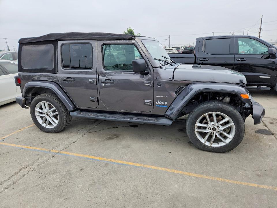 2021 Jeep Wrangler / VIN 1C4JJXP65MW749934 COPART salvage auction — SIDE, Tx - Dis/Dlr/Exp Only Salvage Title, sold $16,000 on 2026-07-29 (photo 4)