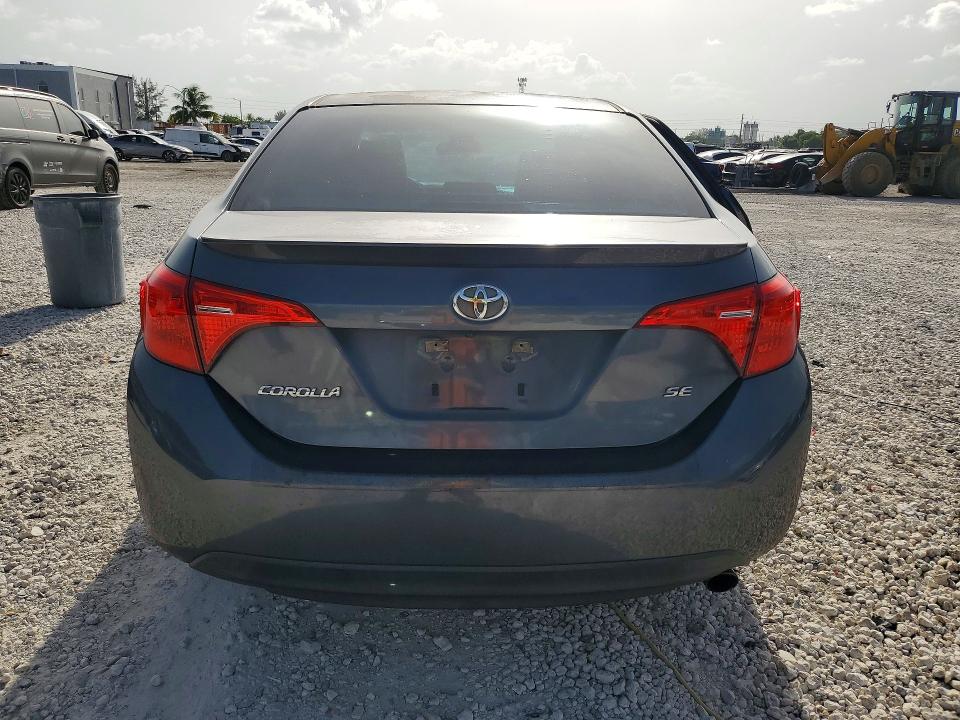 2017 Toyota Corolla VIN 5YFBURHE8HP616757 COPART salvage auction — SIDE, Fl - Cert Of Title Slvg Rebuildable, sold $2,100 on 2026-07-28 (photo 6)