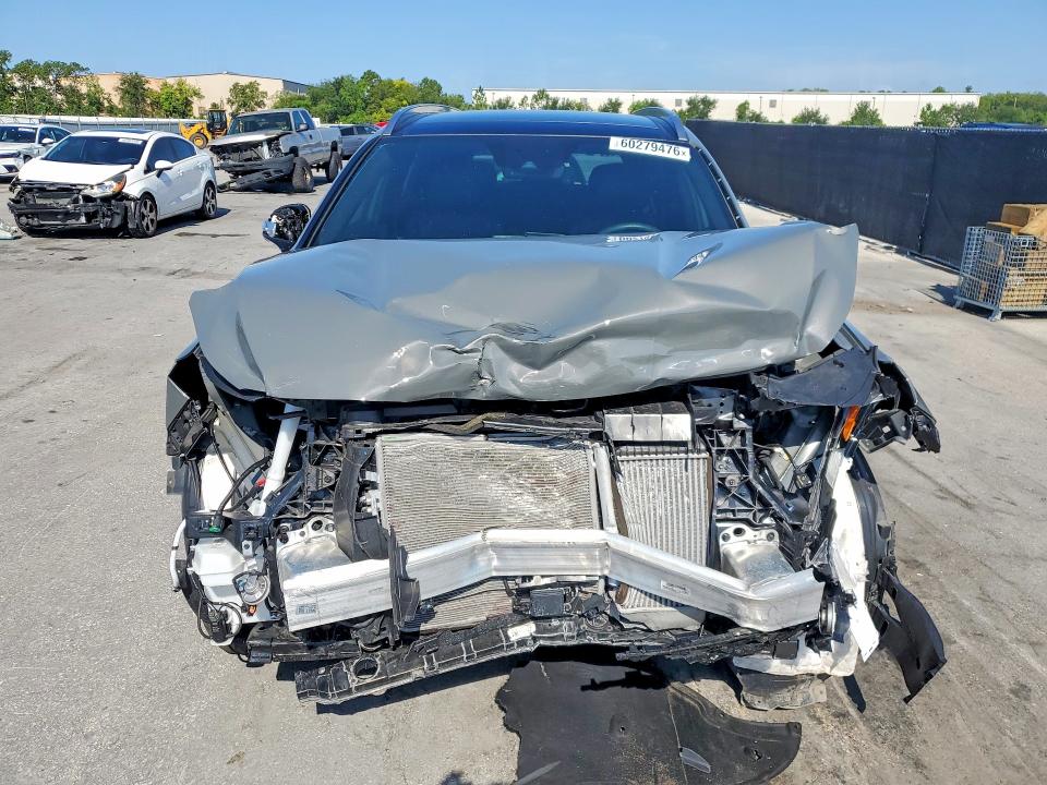 2023 Hyundai Santa fe VIN 5NMS54ALXPH658042 COPART salvage auction — FRONT END, Fl - Certificate Of Destruction, sold $4,450 on 2026-08-20 (photo 5)
