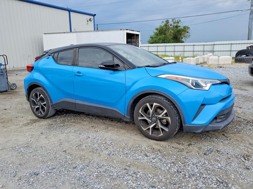 2019 Toyota C-hr VIN NMTKHMBXXKR096169 COPART salvage auction — VANDALISM, Fl - Cert Of Title Slvg Rebuildable, sold $6,400 on 2026-07-31 (photo 4)