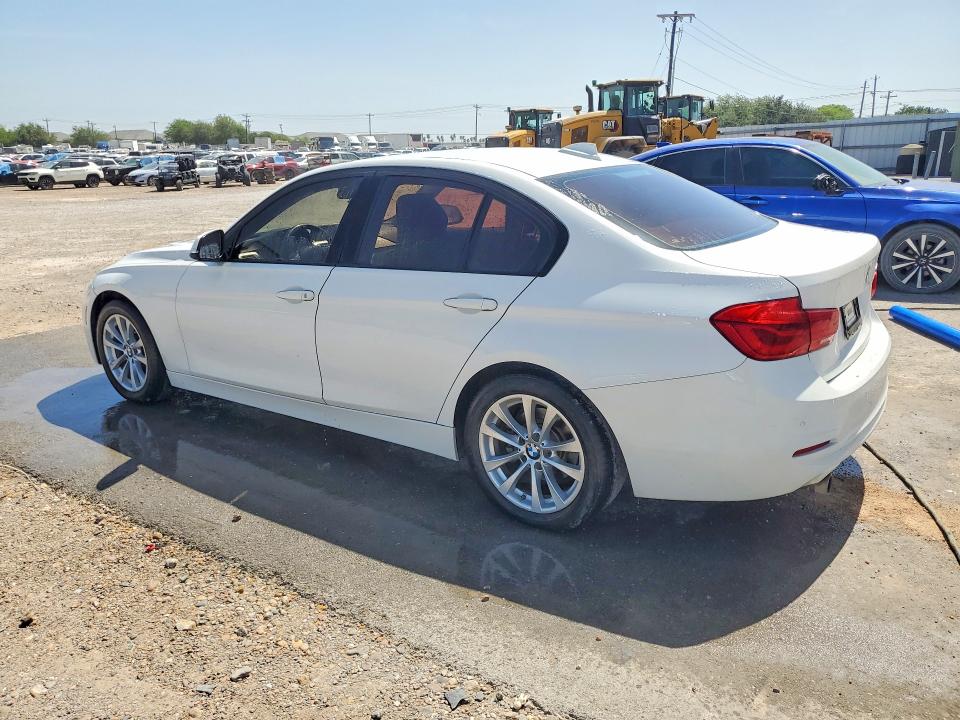 2017 BMW 3 series VIN WBA8E1G57HNU12939 COPART salvage auction — MINOR DENT/SCRATCHES, TX - CERT OF TITLE-REBUILT SALVAGE, sold $3,350 on 2026-07-22 (photo 2)