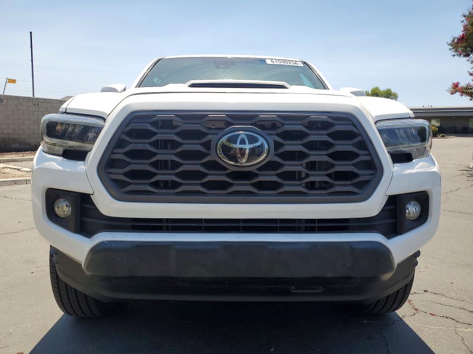 2023 Toyota Tacoma VIN 3TMCZ5ANXPM640220 COPART salvage auction — MINOR DENT/SCRATCHES, CA - DIS/DLR/EXP ONLY CLEAN TITLE (P), sold $27,500 on 2026-07-30 (photo 5)