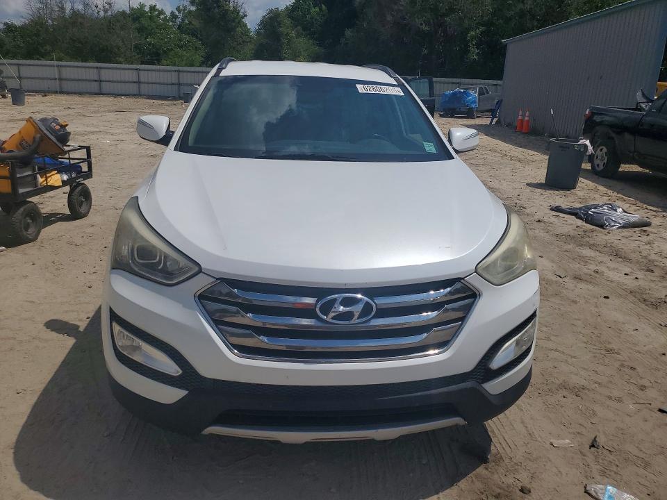 2014 Hyundai Santa fe VIN 5XYZU3LB1EG220582 COPART salvage auction — MINOR DENT/SCRATCHES, Fl - Certificate Of Title, sold $2,050 on 2026-07-31 (photo 5)