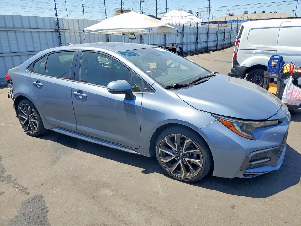 2020 Toyota Corolla VIN JTDT4RCE0LJ043166 COPART salvage auction — SIDE, Salvage Title, sold $3,600 on 2026-07-22 (photo 4)