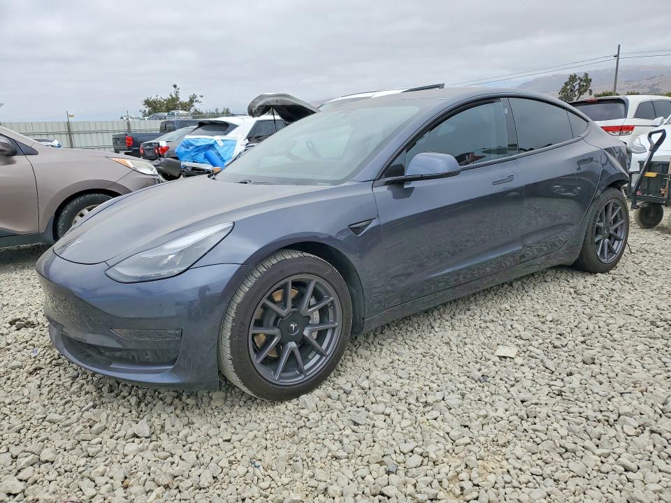 2021 Tesla Model 3 VIN 5YJ3E1EAXMF998770 COPART salvage auction — REAR END, Ca - Salvage Certificate, sold $7,200 on 2026-07-14 (photo 1)