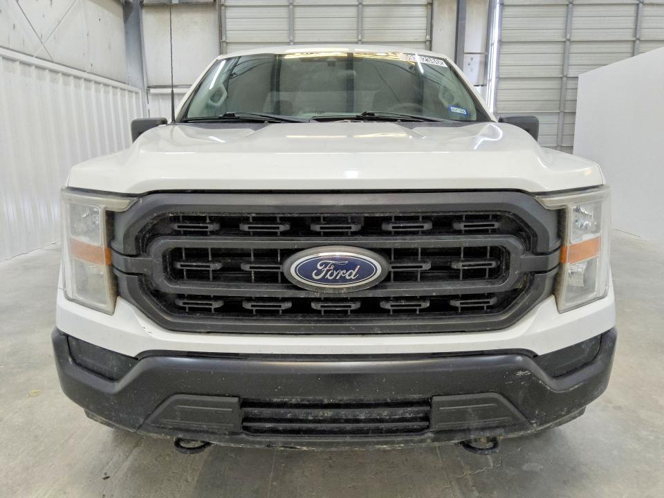 2021 Ford F-150 lightning VIN 1FTFW1E51MFC04151 COPART salvage auction — MINOR DENT/SCRATCHES, Tx - Certificate Of Title, sold $11,300 on 2026-07-28 (photo 5)