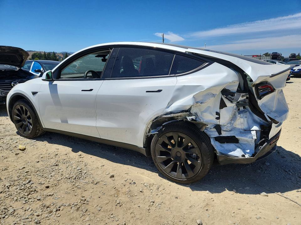 2023 Tesla Model y VIN 7SAYGDEE8PF690587 COPART salvage auction — REAR END, CA - SALVAGE CERTIFICATE, sold $2,300 on 2026-07-28 (photo 2)