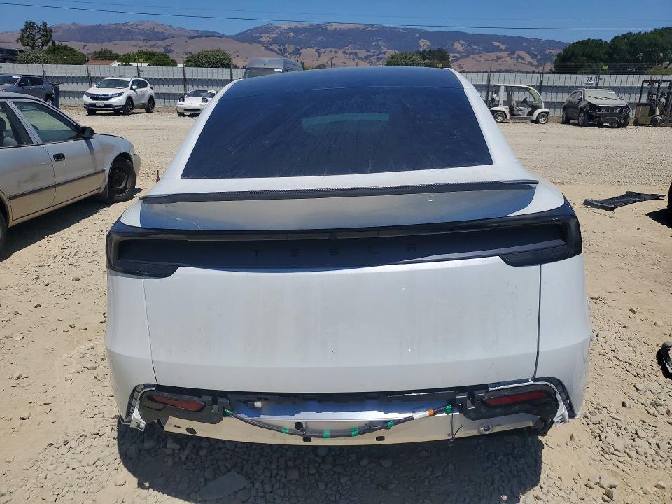 2026 Tesla Model y VIN 7SAYGDED7TF431994 COPART salvage auction — FRONT END, Ca - Dis/Dlr/Exp Only Clean Title, sold $22,500 on 2026-07-15 (photo 6)