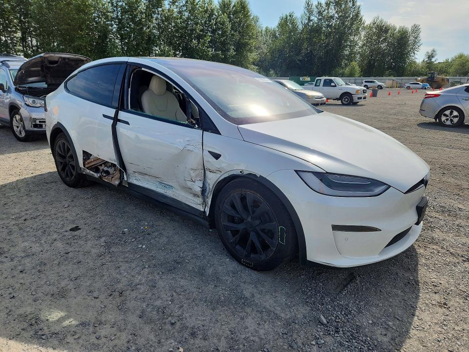 2022 Tesla Model x VIN 7SAXCAE5XNF358234 COPART salvage auction — SIDE, WA - CERT OF OWNERSHIP-REBUILT, sold $17,400 on 2026-07-27 (photo 4)