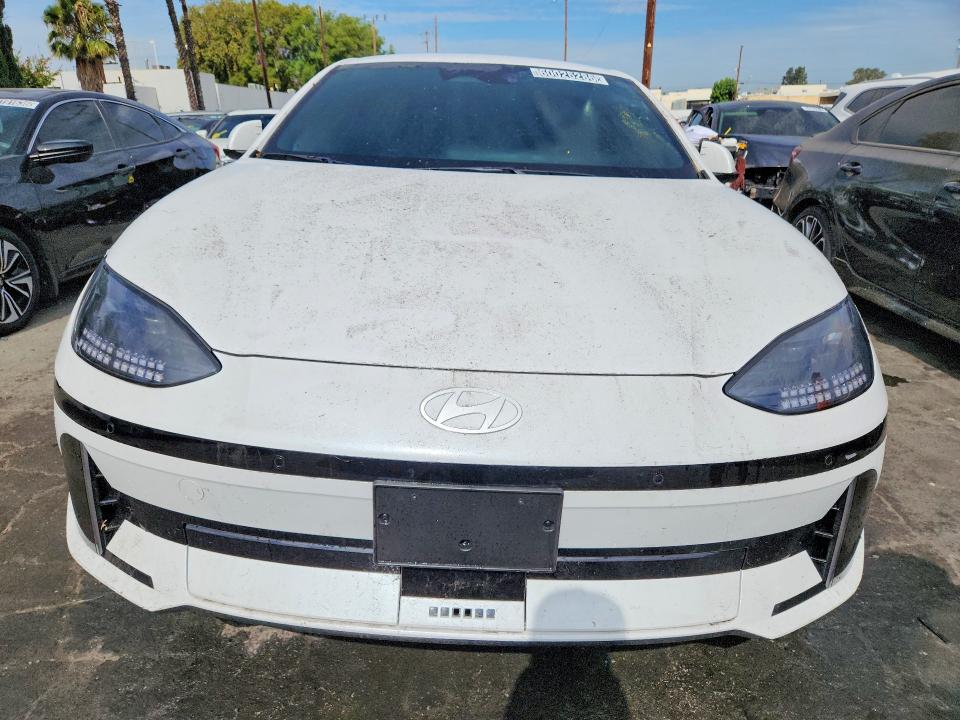 2025 Hyundai Ioniq 6 VIN KMHM34AA7SA114562 COPART salvage auction — SIDE, Ca - Certificate Of Title, sold $8,100 on 2026-08-04 (photo 5)