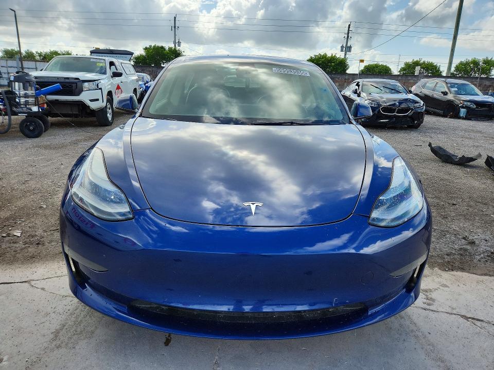 2022 Tesla Model 3 VIN 5YJ3E1EA2NF289901 COPART salvage auction — REAR END, FL - CERTIFICATE OF TITLE, sold $6,300 on 2026-07-20 (photo 5)