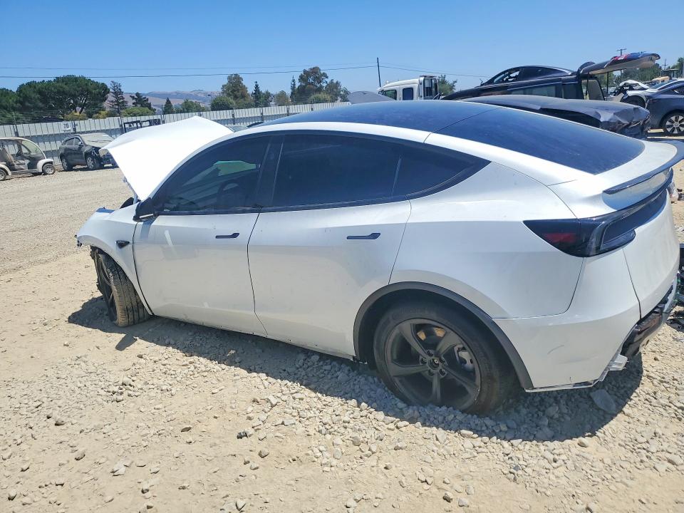 2026 Tesla Model y VIN 7SAYGDED7TF431994 COPART salvage auction — FRONT END, Ca - Dis/Dlr/Exp Only Clean Title, sold $22,500 on 2026-07-15 (photo 2)