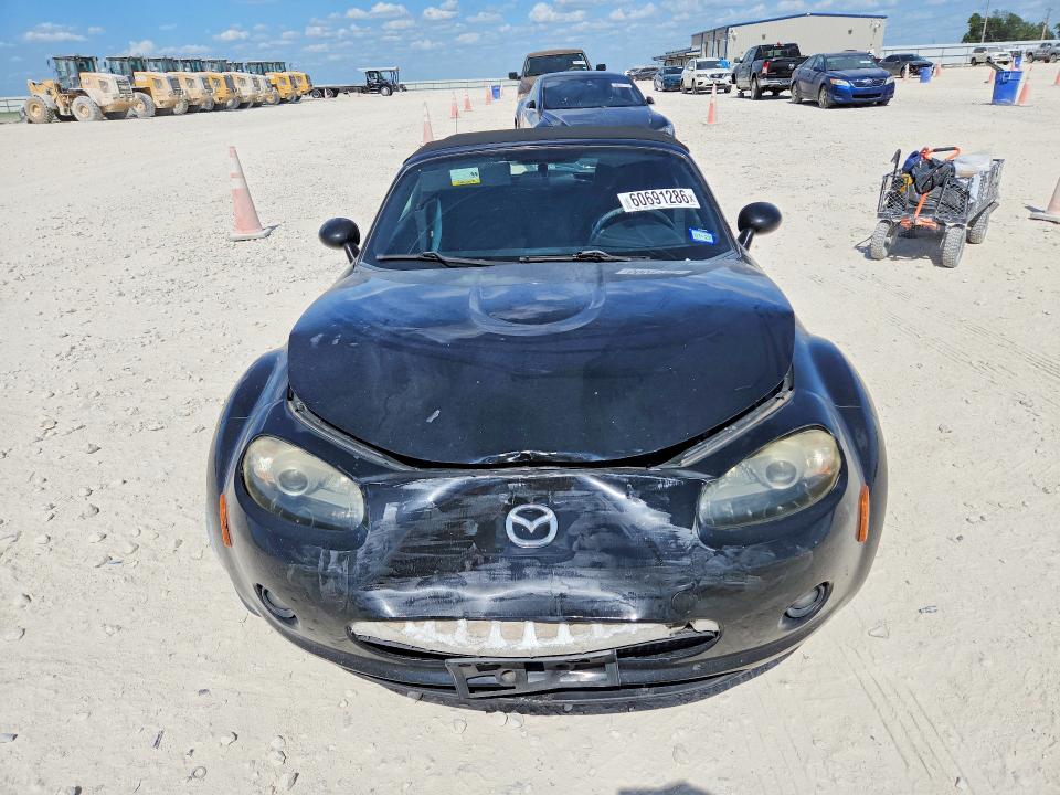 2006 Mazda Mx-5 miata VIN JM1NC25F760120540 COPART salvage auction — FRONT END, TX - SALVAGE VEHICLE TITLE (P), sold $975 on 2026-07-16 (photo 5)