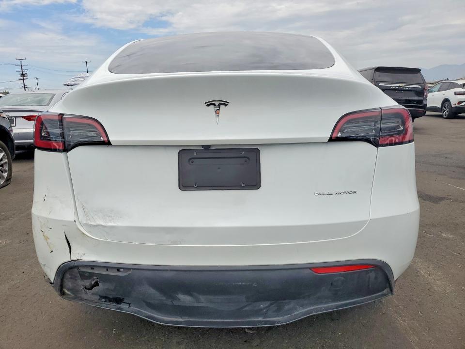 2023 Tesla Model y VIN 7SAYGDEE0PA154245 COPART salvage auction — REAR END, Ca - Salvage Certificate, sold $9,100 on 2026-07-15 (photo 6)