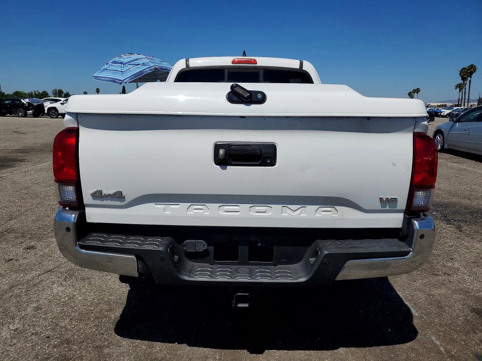 2018 Toyota Tacoma VIN 5TFSZ5AN8JX123088 COPART salvage auction — MINOR DENT/SCRATCHES, Fl - Dis/Dlr/Exp Only Clean Title (P), sold $10,200 on 2026-07-21 (photo 6)
