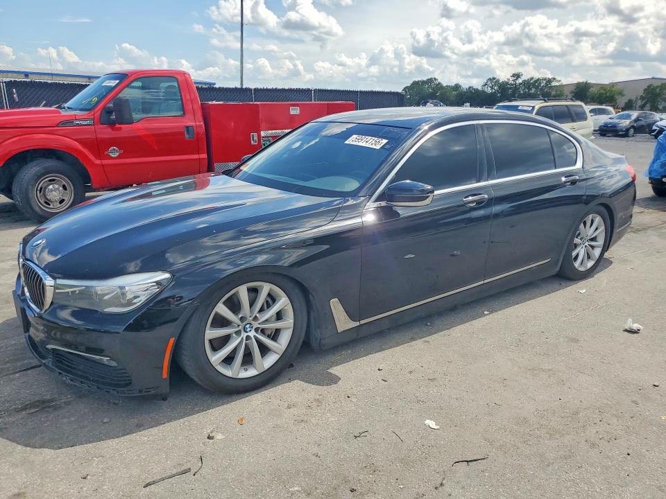 2018 BMW 7er VIN WBA7E4C50JGV23989 COPART salvage auction — MINOR DENT/SCRATCHES, In - Certificate Of Title, sold $7,800 on 2026-07-28 (photo 1)
