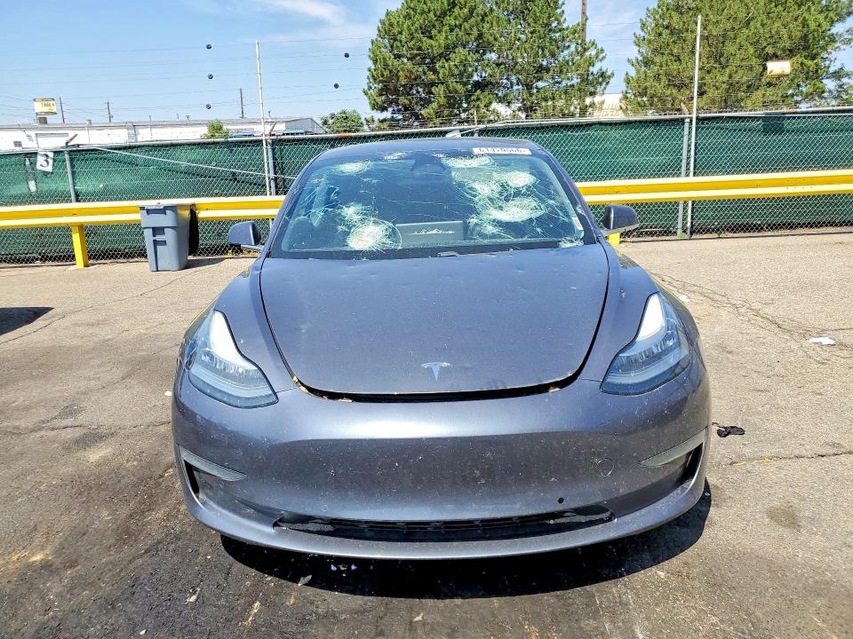 2020 Tesla Model 3 VIN 5YJ3E1EB0LF638057 COPART salvage auction — HAIL, Co - Certificate Of Title, sold $10,100 on 2026-09-01 (photo 5)