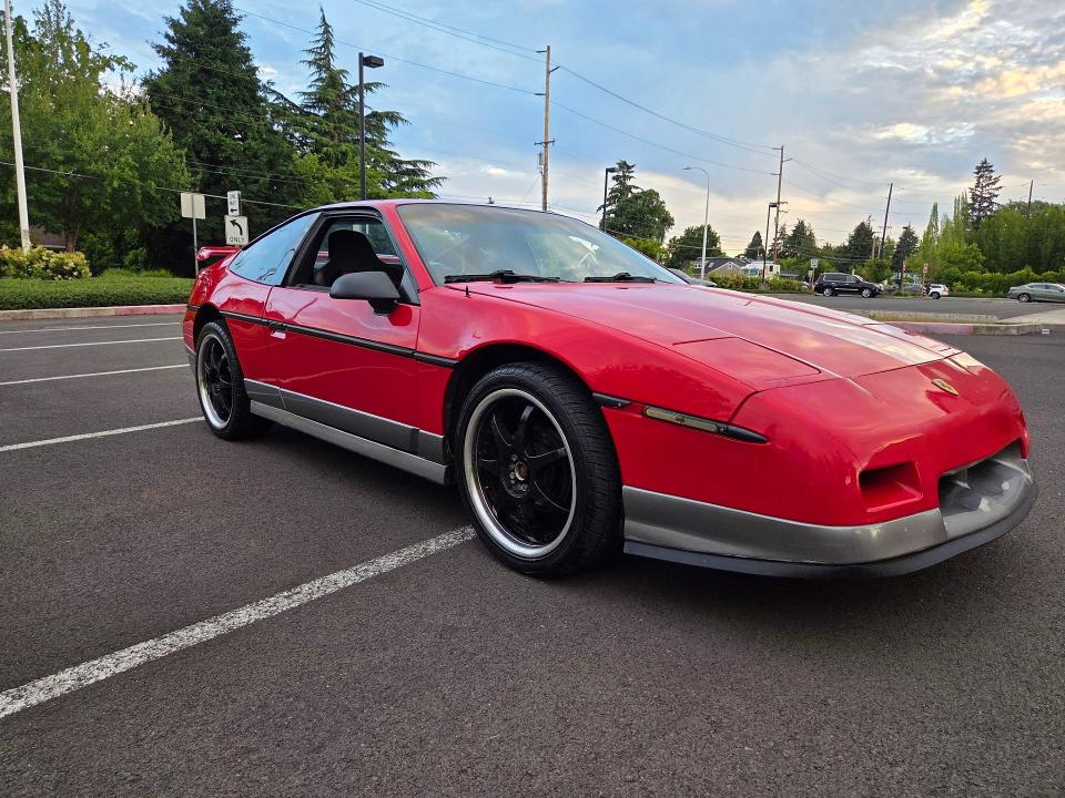 1986 Pontiac Fiero VIN 1G2PG9797GP281044 COPART salvage auction — NORMAL WEAR, Or - Certificate Of Title (P), sold $13,500 on 2026-07-27 (photo 1)
