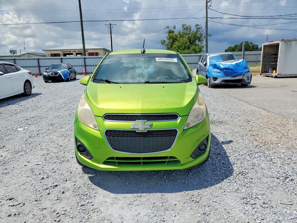 2015 Chevrolet VIN KL8CB6S98FC809123 COPART salvage auction — SIDE, Fl - Certificate Of Title, sold $525 on 2026-07-17 (photo 5)