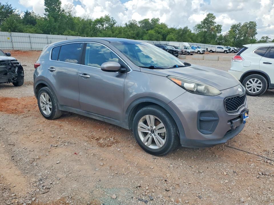 2019 Kia Sportage VIN KNDPM3AC0K7513417 COPART salvage auction — MINOR DENT/SCRATCHES, OK - CERTIFICATE OF TITLE (P), sold $3,450 on 2026-07-28 (photo 4)
