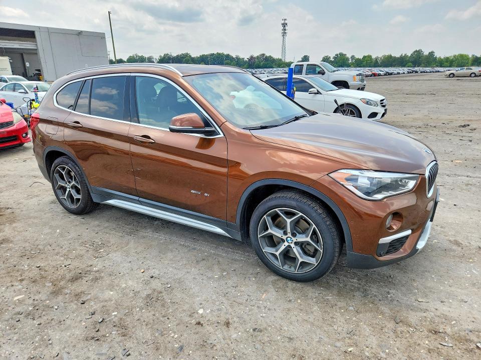 2017 BMW X1 VIN WBXHU7C3XH5H32940 COPART salvage auction — MINOR DENT/SCRATCHES, VA - CERTIFICATE OF TITLE, sold $2,550 on 2026-07-22 (photo 4)
