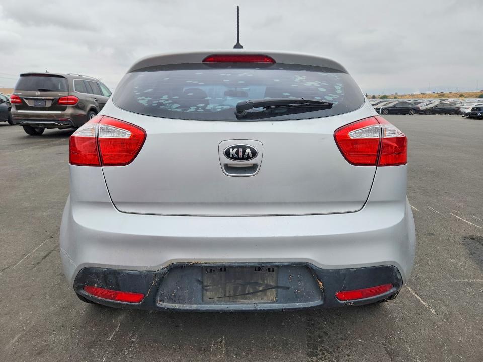 2014 Kia Rio VIN KNADN5A3XE6355414 COPART salvage auction — MECHANICAL, Ca - Dis/Dlr/Exp Only Clean Title, sold $475 on 2026-07-08 (photo 6)