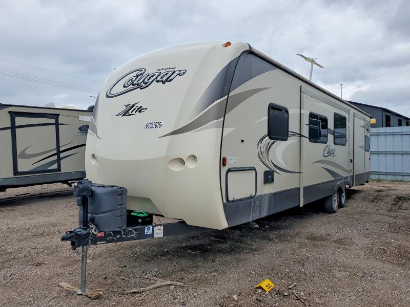 2017 Keystone Cougar VIN 4YDT31S2XHV504222 COPART salvage auction — HAIL, NE - CERT OF TITLE-SALVAGE, sold $4,999 on 2026-09-14 (photo 2)