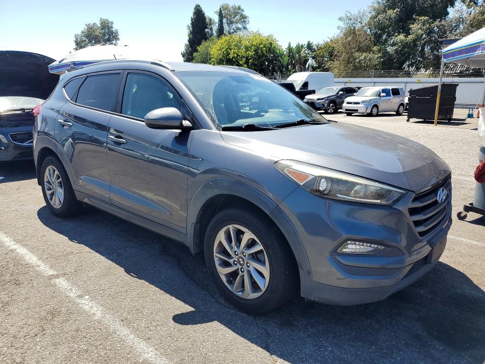 2016 Hyundai Tucson VIN KM8J33A42GU182913 COPART salvage auction — NORMAL WEAR, Ca - Dis/Dlr/Exp Only Clean Title (P), sold $1,700 on 2026-07-31 (photo 4)