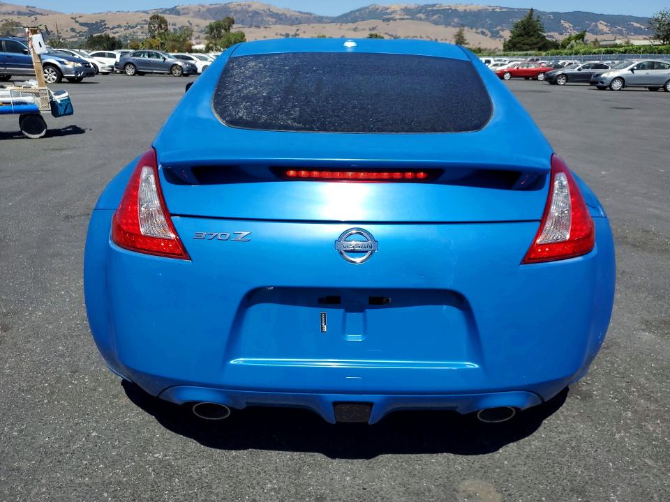 2011 Nissan 370z VIN JN1AZ4EHXBM551762 COPART salvage auction — VANDALISM, Fl - Dis/Dlr/Exp Only Salvage Title, sold $5,100 on 2026-07-28 (photo 6)