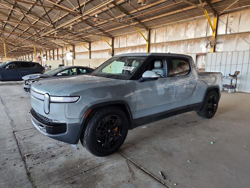 2024 Rivian R1t VIN 7FCTGAAA6RN032337 COPART salvage auction — BURN, AZ - CERT OF TITLE - SALVAGE, sold $28,750 on 2026-10-12 (photo 1)