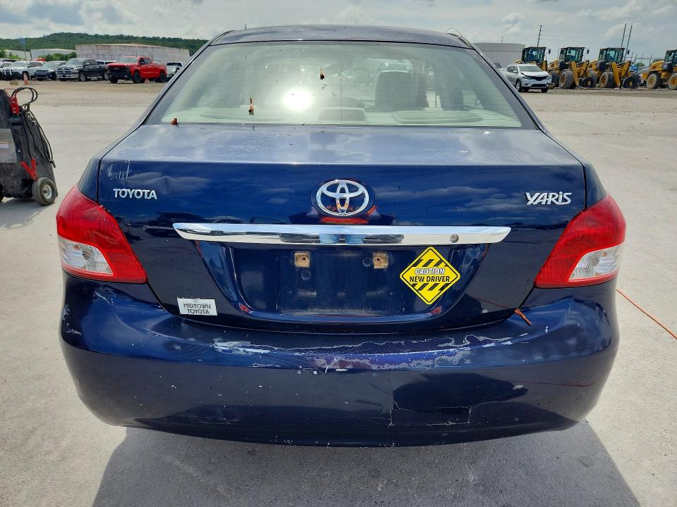 2007 Toyota Yaris VIN JTDBT923471039660 COPART salvage auction — SIDE, Ok - Certificate Of Title, sold $1,000 on 2026-07-08 (photo 6)