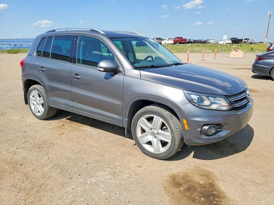 2015 Volkswagen Tiguan VIN WVGJV7AX7FW544216 COPART salvage auction — SIDE, AB - OOP - SALVAGE, sold $3,100 on 2026-08-04 (photo 4)
