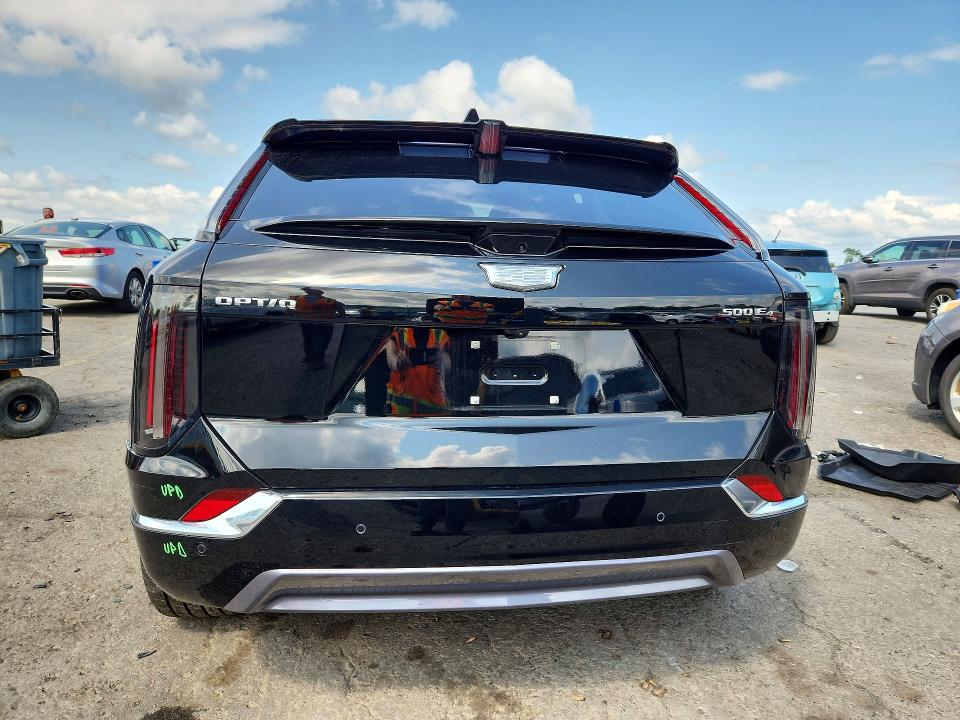 2025 Cadillac Optiq VIN 3GYK3DMR2SS159138 COPART salvage auction — SIDE, Salvage Title, sold $17,900 on 2026-08-04 (photo 6)